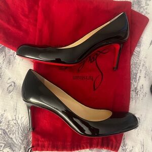 Christian Louboutin
Patent Leather Pumps